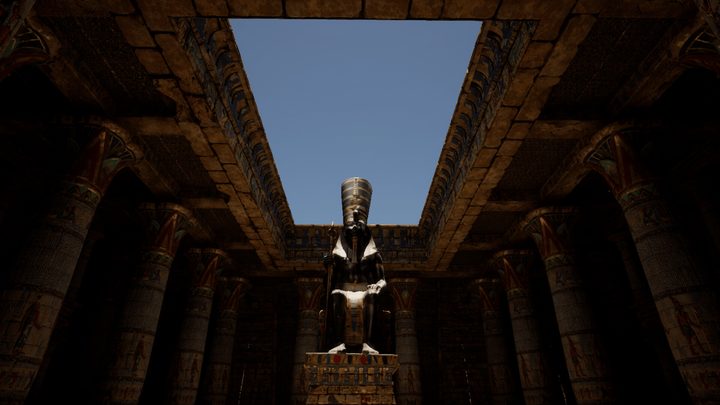 A colossal pharaoh statue enthroned beneath an open sky